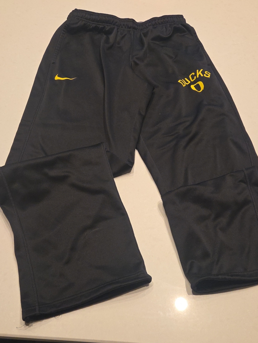 Nike Black Joggers with Yellow Ducks Detail